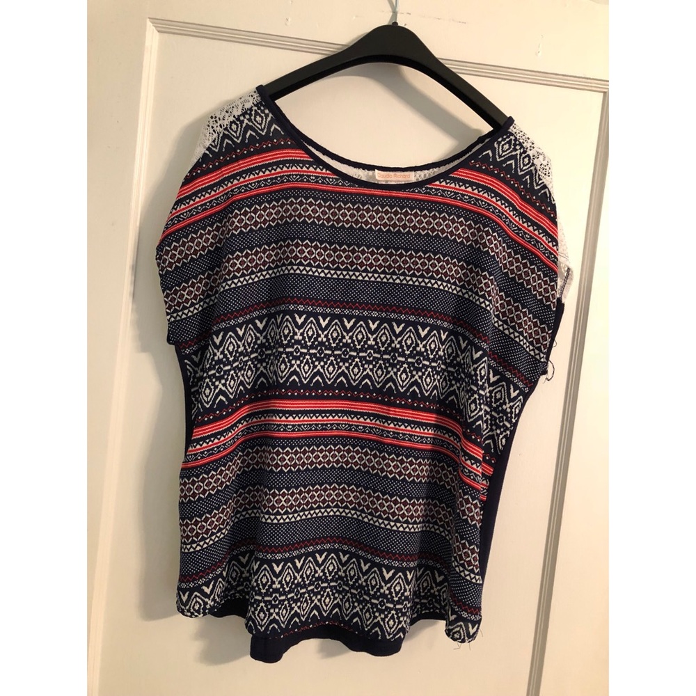 Red, white, blue patterned blouse